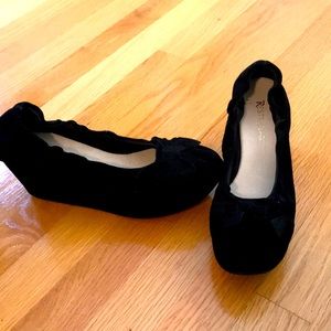 Blacks suede wedge Adorable bow tie in the front. Ruffled edges. Never worn.